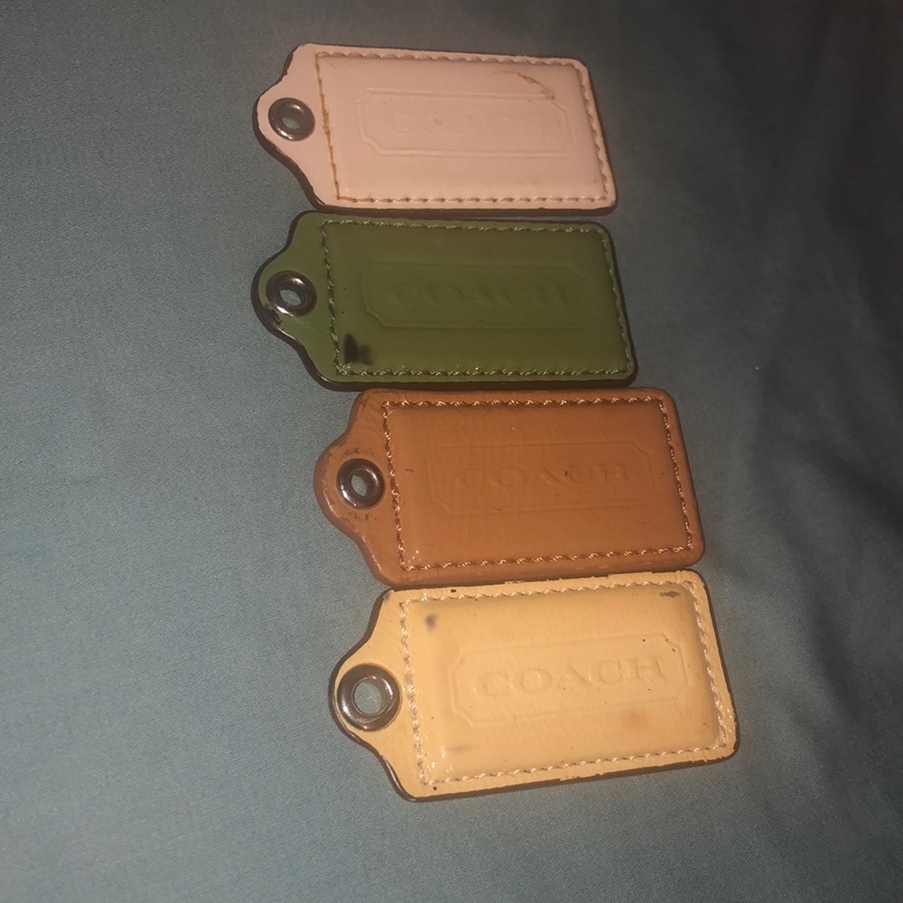 Coach bundle of 4 damaged purse tags with no hang’s